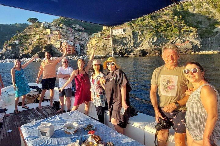 Boat Tour in Cinque Terre: Enjoy a Sunset Cruise on a Traditional Ligurian Gozzo